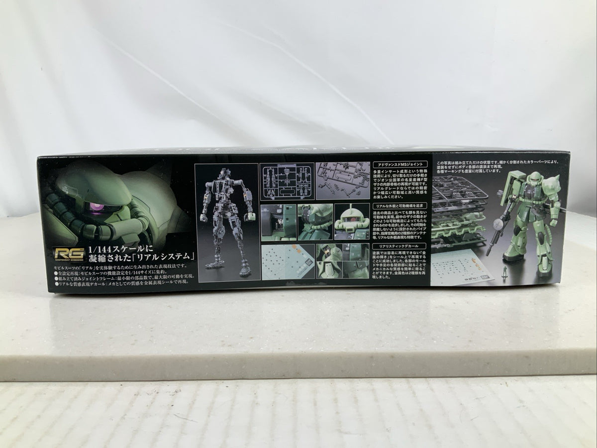 BANDAI RG MS 06F Zaku II 04 1:144 model kit DISTRESSED BOX3