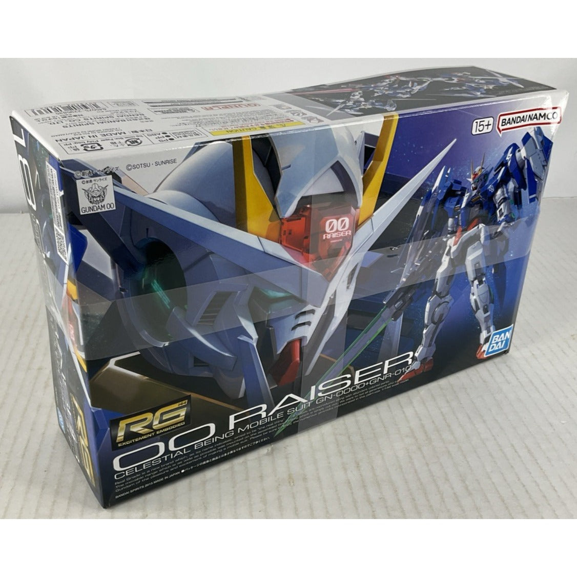 BANDAI RG 00 Raiser GN-0000 GNR-010 18 1:144 model kit DISTRESSED BOX
