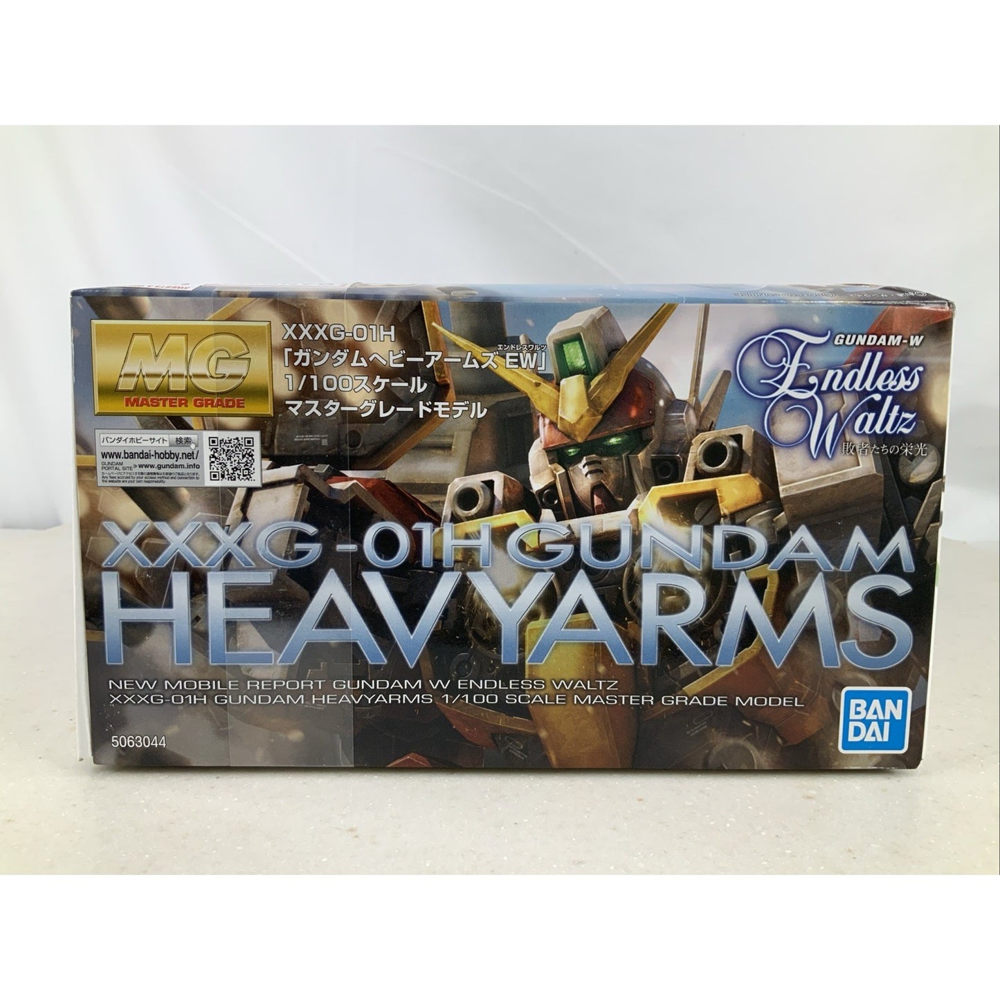 BANDAI MG Gundam Heavyarms EW XXXG-01H 1:100 model kit DISTRESSED BOX